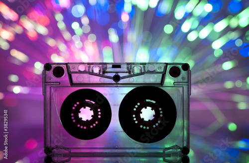 Photo: Cassette tape and multicolored lights Cassette tape and multicolored lights