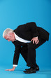 Man touching the floor