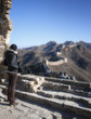 Beautiful girl standing on the Great Wall of China - Simatai