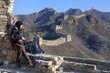 Beautiful girl standing on the Great Wall of China - Simatai