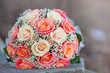 bouquet of the bride executed from light pink and beige roses