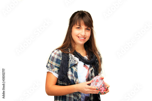 Photo: young girl holding a gift box young girl holding a gift box