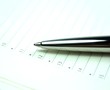 Pen on the blank notebook