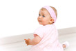 Photo: Portrait of cute baby girl with pink head band Portrait of cute baby girl with pink head band