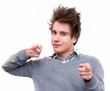 Young man pointing at you