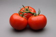 Vine tomatoes on grey