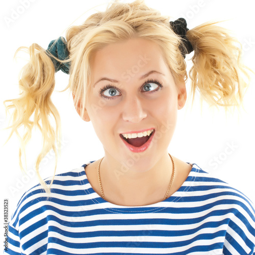 Photo: Woman with a funny look on her face smiles Woman with a funny look on her face smiles