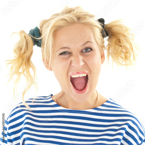 Photo: Woman with a funny look on her face smiles Woman with a funny look on her face smiles