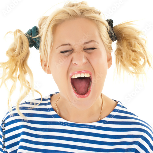 Photo: Woman with a funny look on her face smiles Woman with a funny look on her face smiles