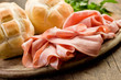 Mortadella with Bread on Chopping board