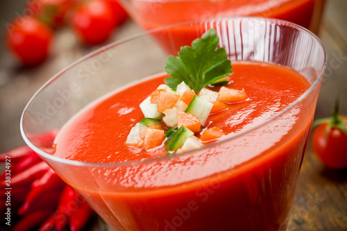 Photo: Gazpacho on wooden table Gazpacho on wooden table