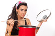 Photo: Beautiful young woman cooking Beautiful young woman cooking