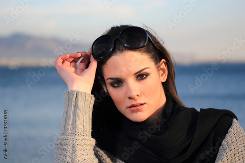 Photo: portrait of a beautiful young woman portrait of a beautiful young woman