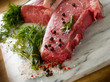 raw porterhouse and tenderloin with mixed herbs juniper berry,pe