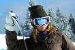 The girl snowboarder on the winter resort of