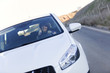 Woman driving her new car