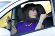 Woman putting the safety belt