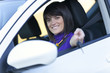Woman driving her new car