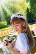 girl going to the first holy communion
