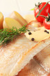 Pan fried fish fillets and potatoes