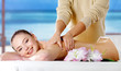 Smiling girl  getting spa massage