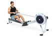 Photo: man doing indoor rowing man doing indoor rowing