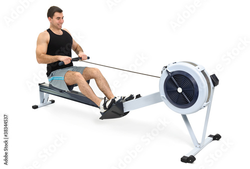 Photo: man doing indoor rowing man doing indoor rowing