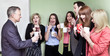 People looking in horror at mans eco unfriendly Styrofoam cup