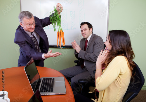 Photo: The great motivator dangling carrots to motivated staff The great motivator dangling carrots to motivated staff