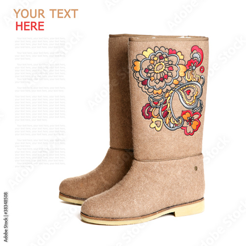 Photo: winter shoes, felt boots, white background (with sample text) winter shoes, felt boots, white background (with sample text)