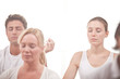 People meditating at the yoga center