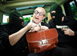 businessman grasped in hostages.
