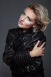 Beauty rock woman in a black leather jacket Beauty rock woman in a black leather jacket