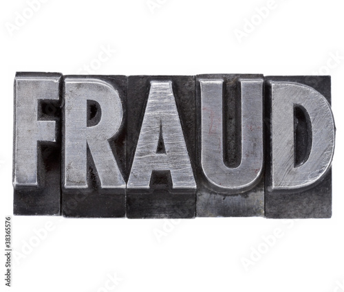 Photo: fraud word in metal type fraud word in metal type