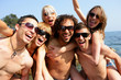 Photo: Group of young adults partying at the beach Group of young adults partying at the beach