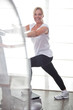 Beautiful woman exercising at the gym