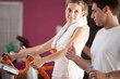 Couple exercising at the gym