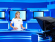 television newscaster at TV studio
