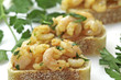 Garlic shrimp tapas on sourdough bread