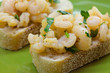 Garlic shrimp tapas on sourdough bread
