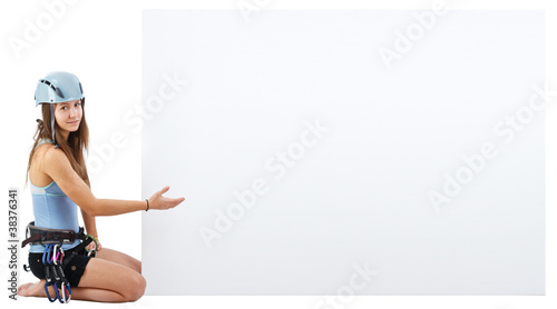 Photo: climbing woman holding a banner climbing woman holding a banner