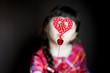 Photo: Heart shaped toy in child's hands Heart shaped toy in child's hands