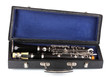 Antique clarinet in case isolated on white Antique clarinet in case isolated on white