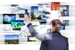 Man working with vurtial screens