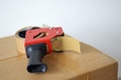 Cardboard box and tape dispenser