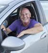 happy experienced driver on the road