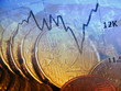 Finance background with market data and euro cents.