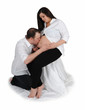 couple embracing their pregnancy. isolated