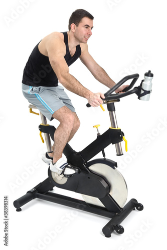 Photo: one man doing indoor biking exercise one man doing indoor biking exercise