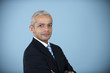 studio portrait of a mature businessman